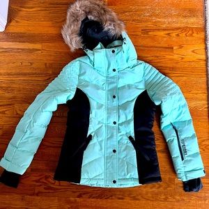 BRAND NEW frosted teal women’s ski jacket. Size M but fits like S or XS